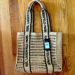 Beachbag or handbag use! Brand new with tags! Straw bag with black detail!